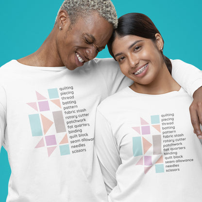 Modeled product image Moxie•Pop's men's long sleeve graphic tee with a half pastel quilt block on the left and a list of quilt terms on the right design in white. 