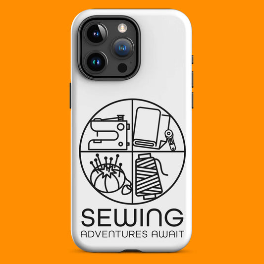 Moxie•Pop's tough case on a iPhone® in white with a black image of a circle in four quadrants each with a sewing tool icon above 'Sewing Adventures Await' with orange backdrop