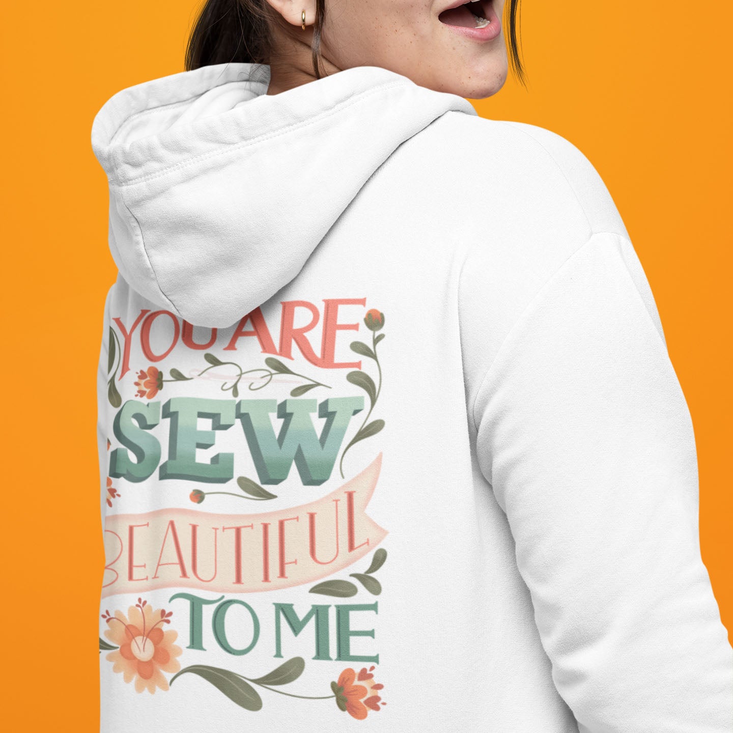 Modeled back view of Moxie•Pop's zip up hoodie with "You are Sew Beautiful to me" in peach with flowers ghost product image in white