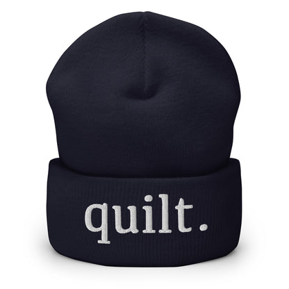 Moxie•Pop's cuffed beanie in navy with "quilt." embroidered in white