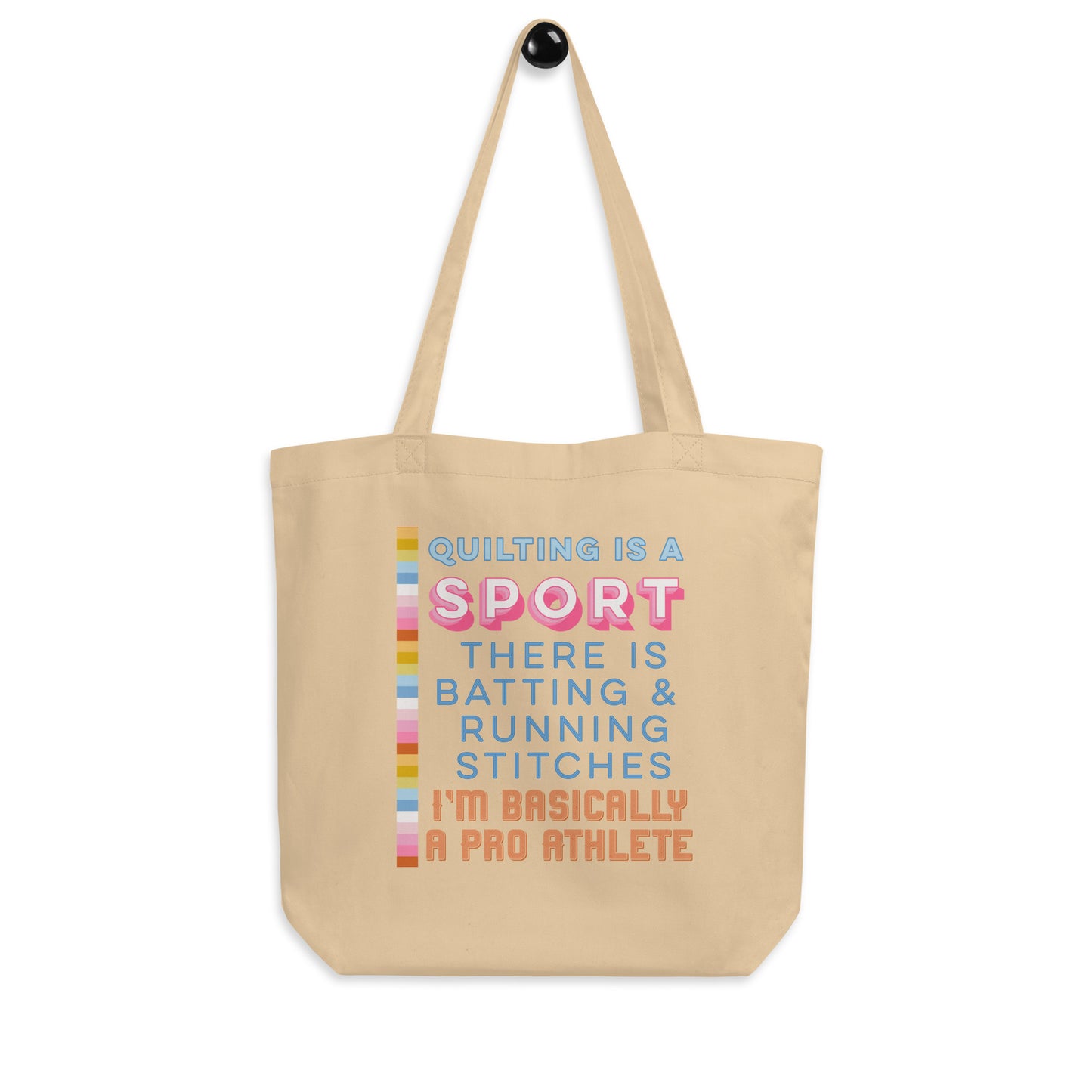 Moxie•Pop's eco tote bag  in oyster with "Quilting is a sport. There's batting and running stitches. I'm basically a pro athlete" graphic