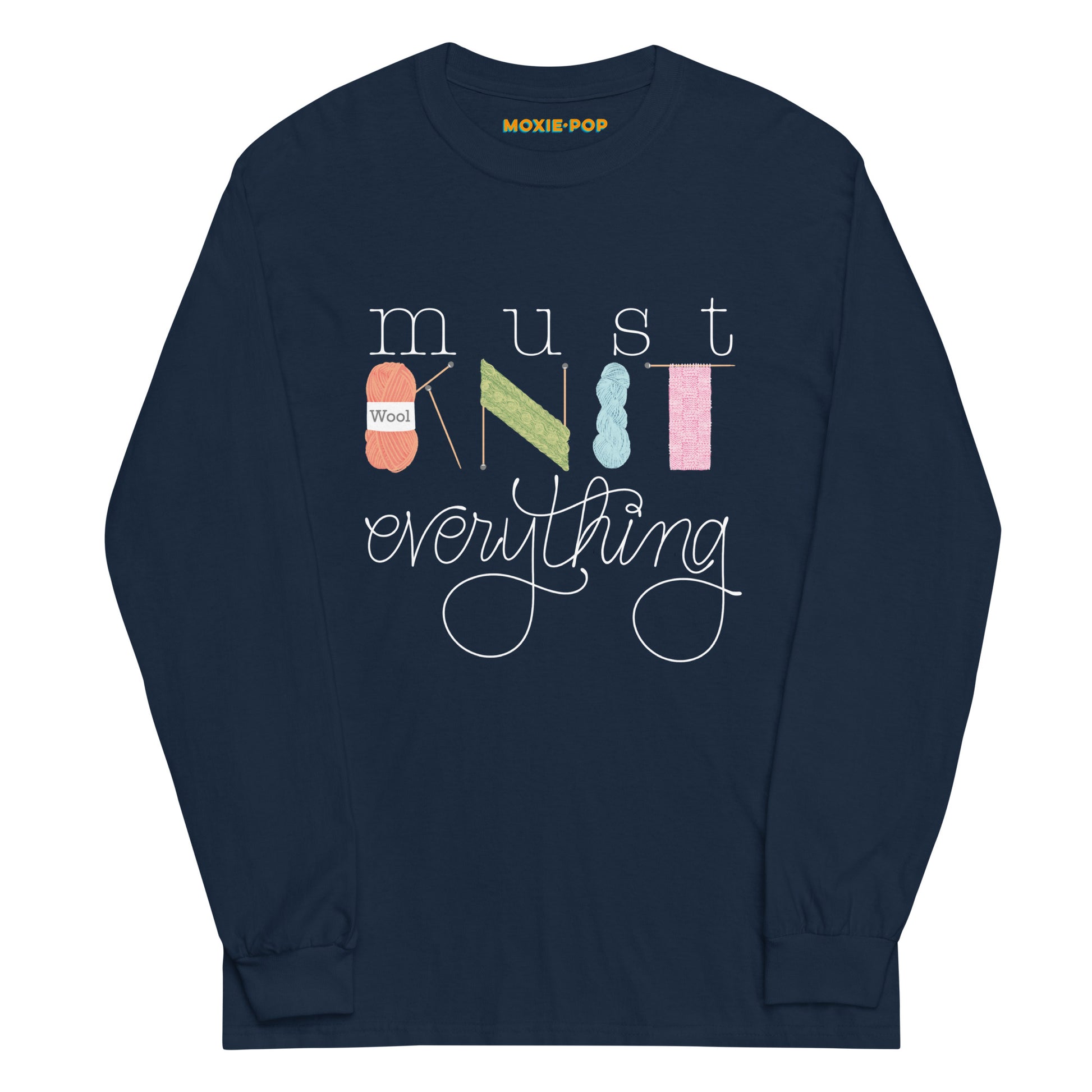 Lay flat product image of Moxie•Pop's men's long sleeve graphic tee with hand lettered 'Must Knit Everything' with the word knit created from illustrations of yarn, needles, and knitting in navy