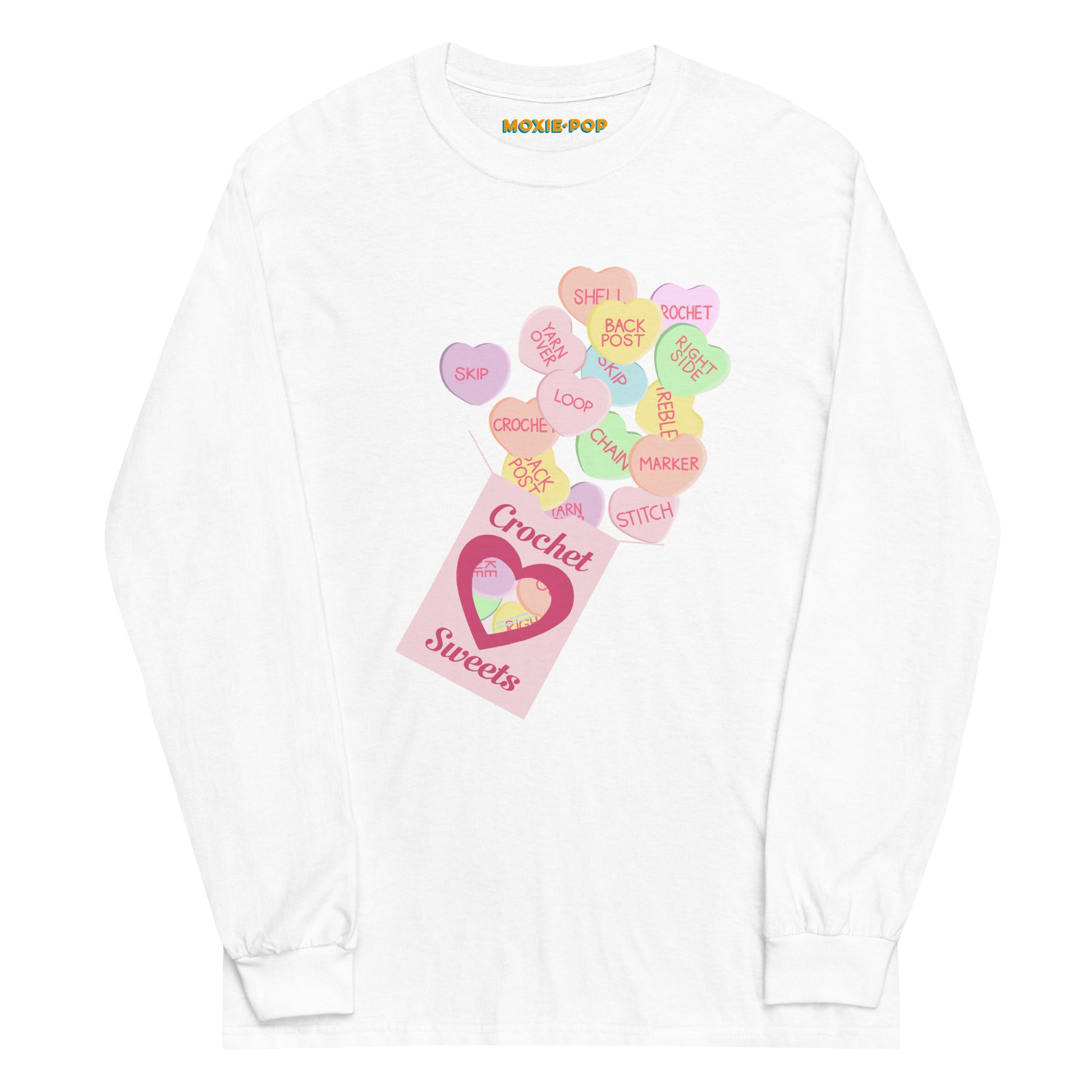 Lay flat product image of Moxie•Pop's men's long sleeve graphic tee with a box of "Crochet Sweets" and conversation hearts with crocheting terms design in white