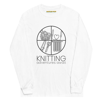 Lay flat product image of Moxie•Pop's men's long sleeve graphic tee with "KNITTING adventures await" below a circle filled with knitting implements icons design in white