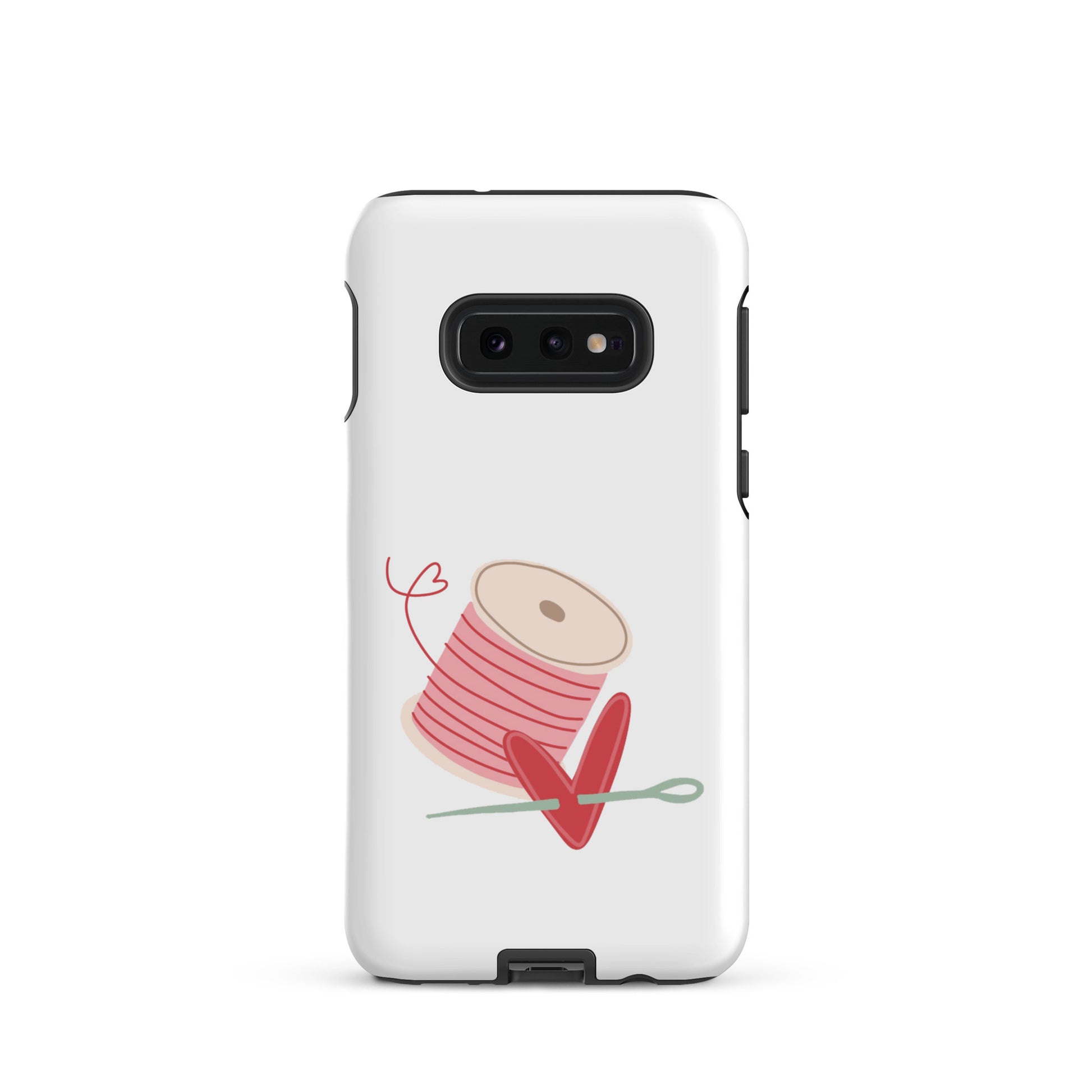 Product image of Moxie•Pop's tough case for Samsung® with a hand-drawn spool of pink thread and a heart pierced by a needle on a Galaxy S10e