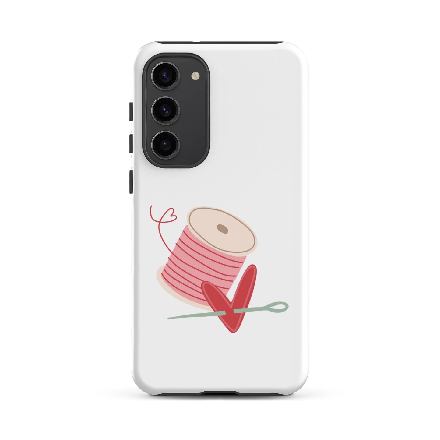 Product image of Moxie•Pop's tough case for Samsung® with a hand-drawn spool of pink thread and a heart pierced by a needle on a Galaxy S23 Plus