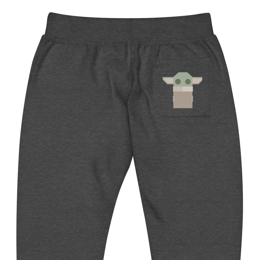 Zoomed in lay flat product image of Moxie•Pop's unisex sweatpants with stylized geometric Grogu on back pocket in charcoal heather