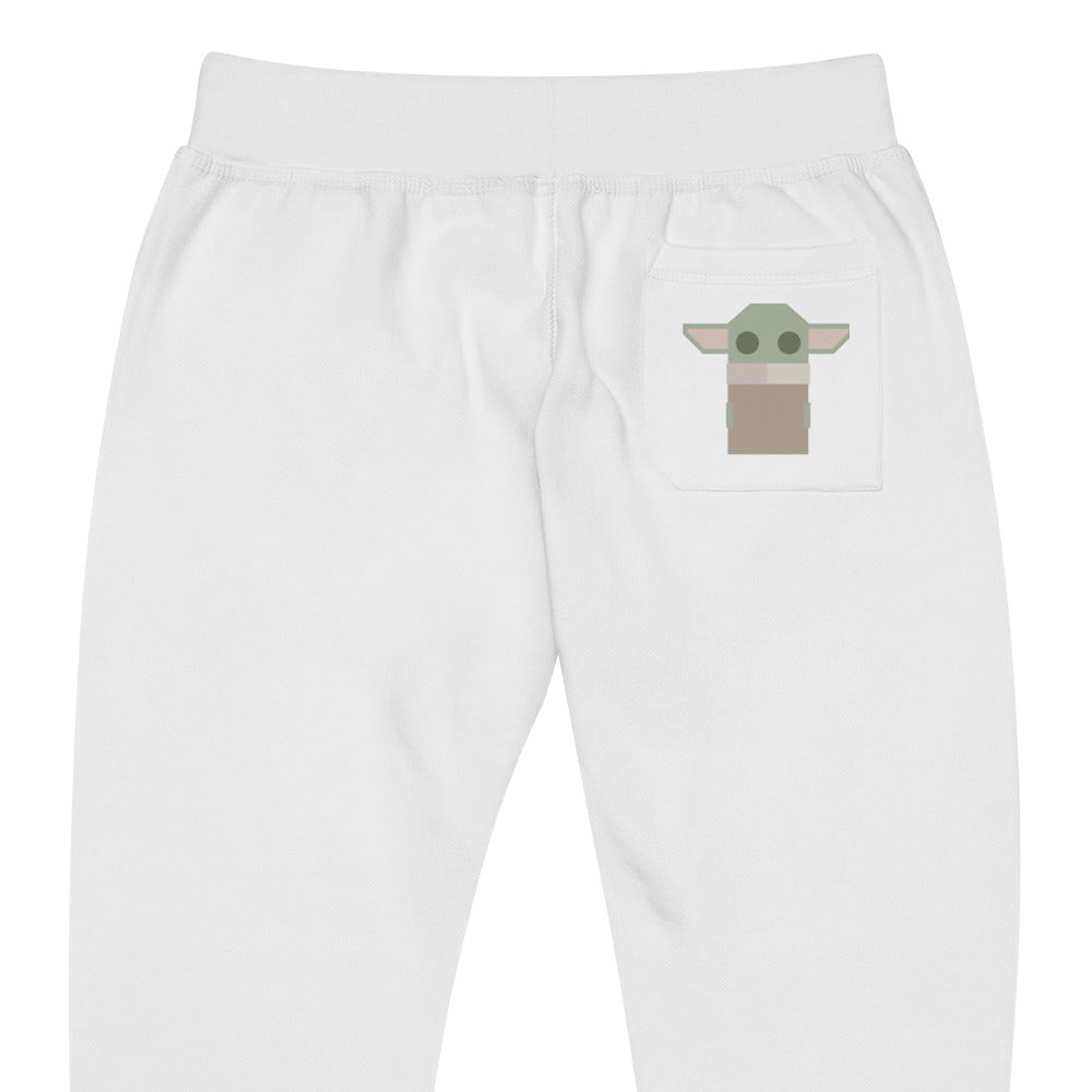 Zoomed in lay flat product image of Moxie•Pop's unisex sweatpants with stylized geometric Grogu on back pocket in white