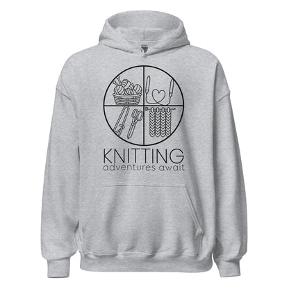 Ghost product image of Moxie•Pop's unisex graphic hoodie with "KNITTING adventures await" below a circle filled with knitting implements icons design in sport grey.