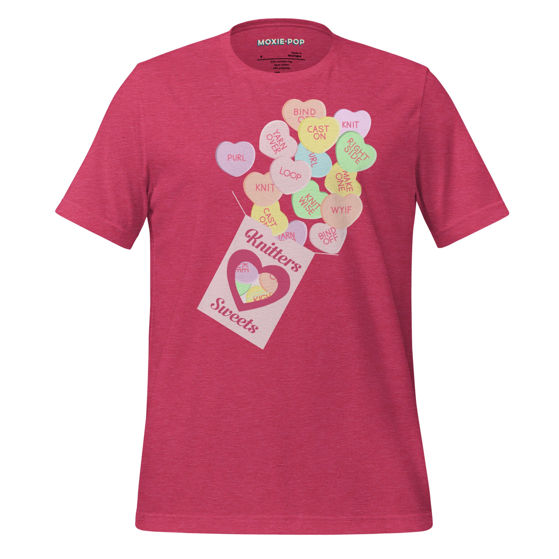 Ghost product image of Moxie•Pop's unisex graphic tee with a box of "Knitter Sweets" and Valentine's conversation hearts with knitting terms design in heather raspberry