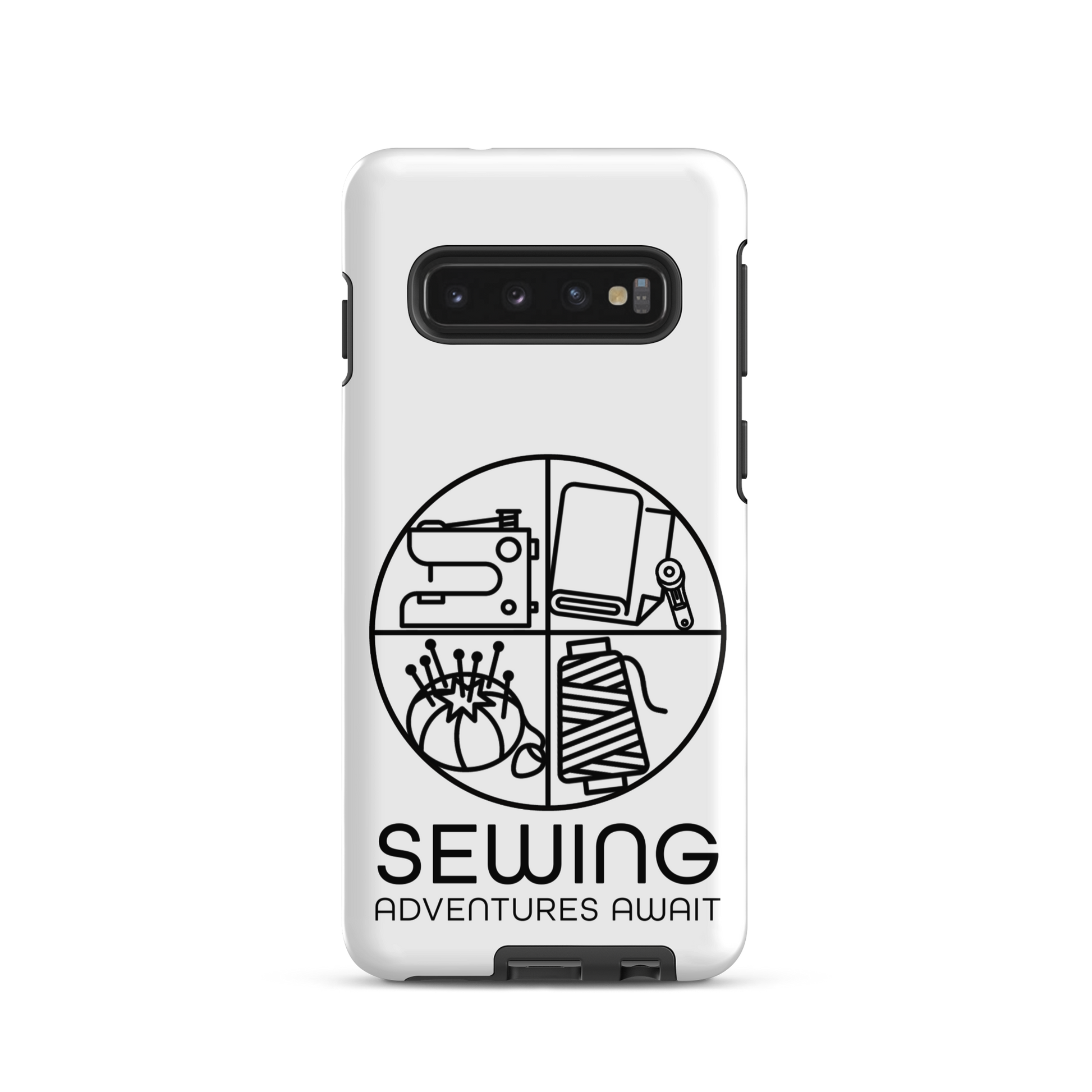 Moxie•Pop's tough case on a Samsung® in white with a black image of a circle in four quadrants each with a sewing tool icon above 'Sewing Adventures Await'. 