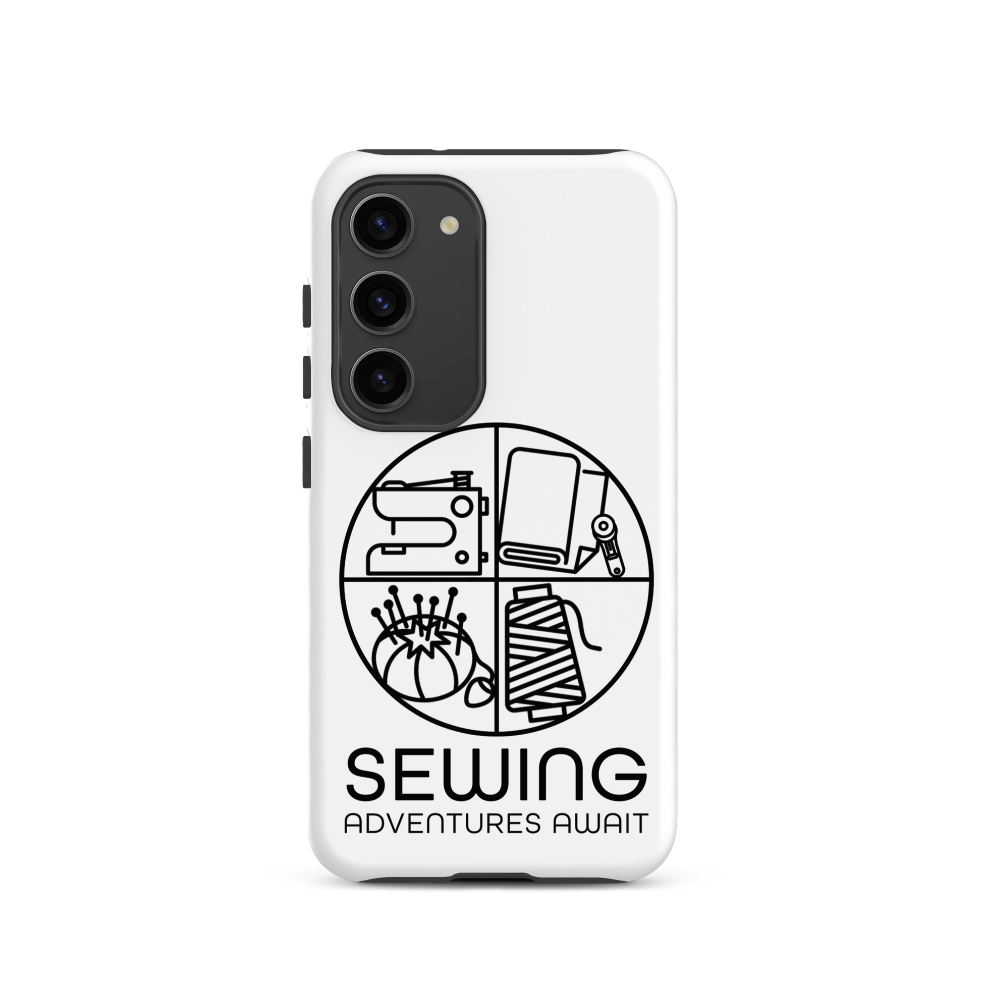 Moxie•Pop's tough case on a Samsung® in white with a black image of a circle in four quadrants each with a sewing tool icon above 'Sewing Adventures Await'. 