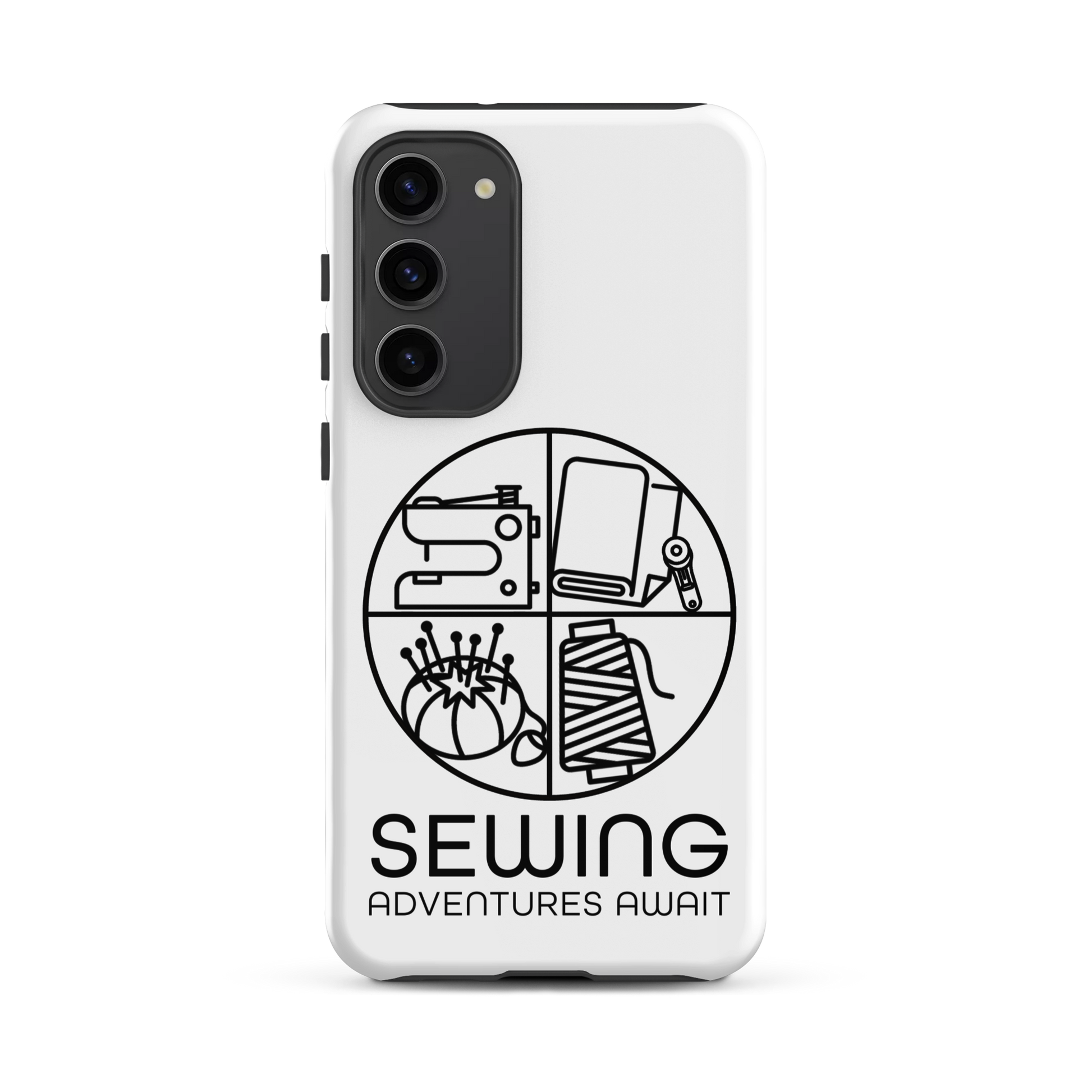 Moxie•Pop's tough case on a Samsung® in white with a black image of a circle in four quadrants each with a sewing tool icon above 'Sewing Adventures Await'. 